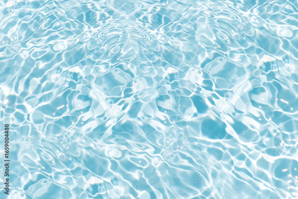 Obraz premium Blue water with ripples on the surface. Defocus blurred transparent blue colored clear calm water surface texture with splashes and bubbles. Water waves with shining pattern texture background.