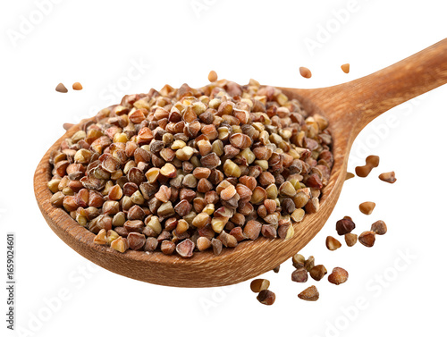 Buckwheat groats in a wooden spoon healthy food