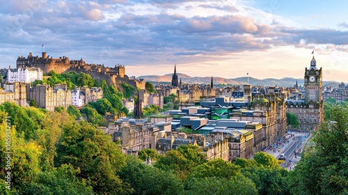 Majestic view of Edinburgh skyline with historical castle, city buildings, and scenic mountains under a dramatic sky
