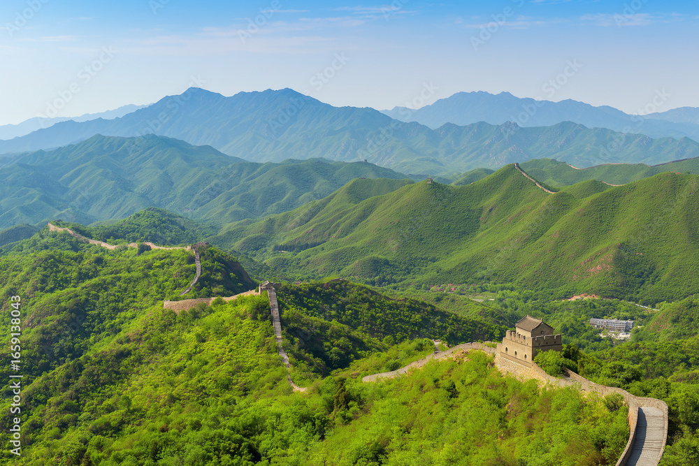 Fototapeta premium Great Wall of China winding through green mountains, panoramic scene