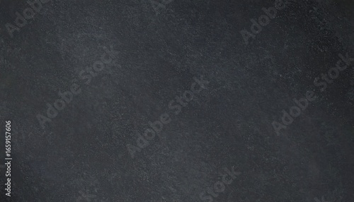 Dark gray stone surface with subtle texture