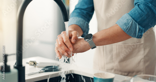 Wallpaper Mural Person, water and washing hands in kitchen for hygiene, germ removal and disinfection for care. Man, faucet and cleaning in home for safety routine, good habit and bacteria prevention at sink Torontodigital.ca