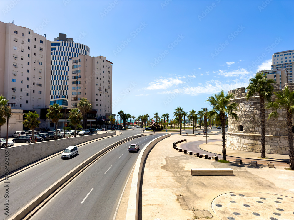 Obraz premium Aerial Bird's eye view of Albanian city Durres. Buildings and beach along Adriatic sea coast.
