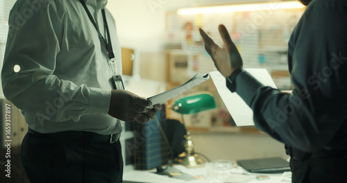 Valokuva Document, hands or detective in office for collaboration, case briefing or discussion