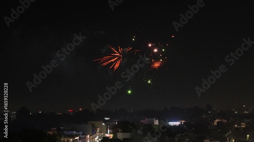 Aerial drone shot of city in diwali with lights on houses 