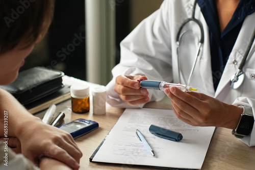 Doctor Explaining How to Use an Insulin Pen