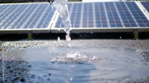 Water Flowing onto Solar Panels Renewable Energy and Sustainable Technology in Action