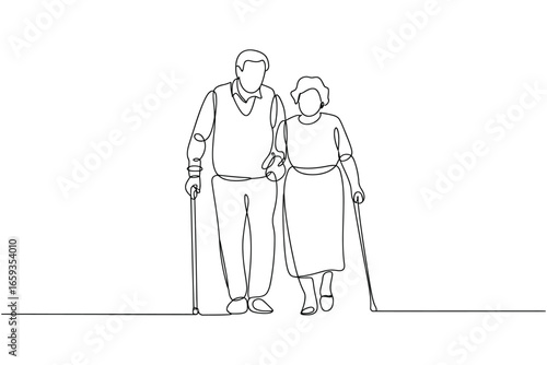 Elderly couple walking together supported by canes