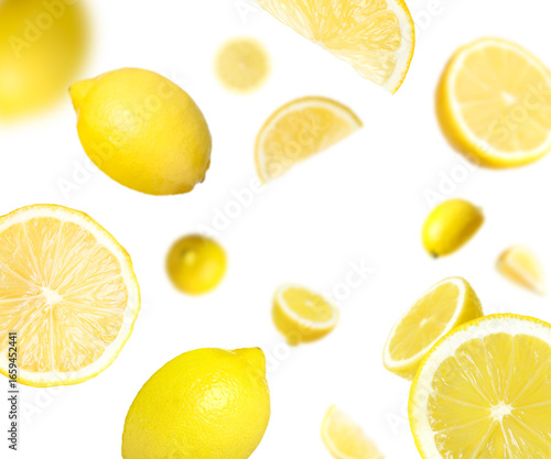 Wallpaper Mural Fresh ripe lemons swirling in air against white background Torontodigital.ca