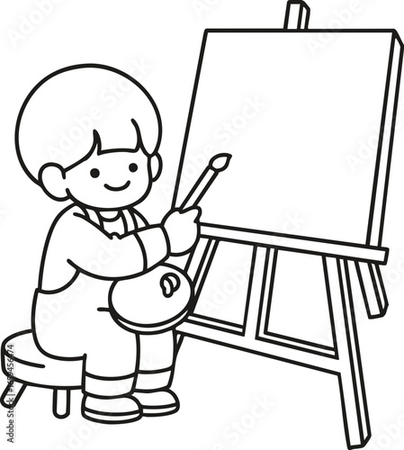 little boy drawing on easel