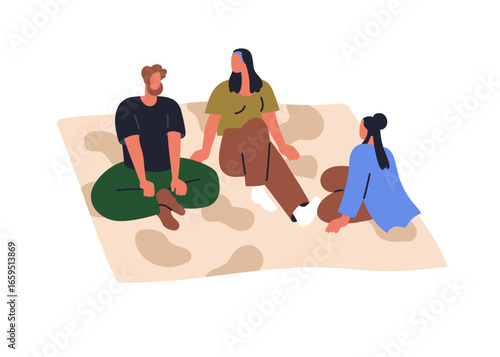 Friends group on blanket. Young man and woman sitting, relaxing, chatting, ou...
