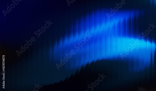 Abstract shiny blue light wave background with stripes effect in the dark. Waved striped glass refraction.