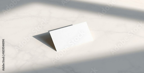 Minimalist business card with soft shadows and light