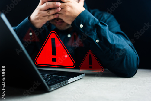 Warning alert system concept. A Man working on the computer, hacked on the computer network, crime and virus, Malicious software, compromised information, illegal connection, data vulnerability,