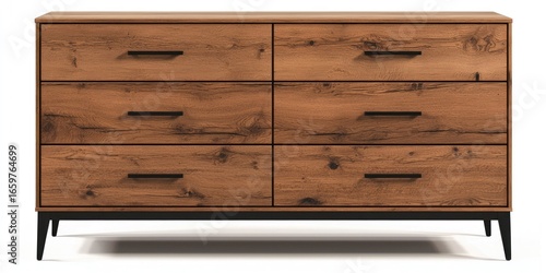 A dark brown wooden dresser stands on a white surface. The dresser has six drawers with dark, rectangular handles. It features a low, minimalist design with black, tapered legs. 