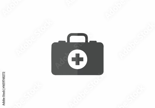 A minimalist icon of a dark gray first aid kit with a white cross symbol on a plain white background.