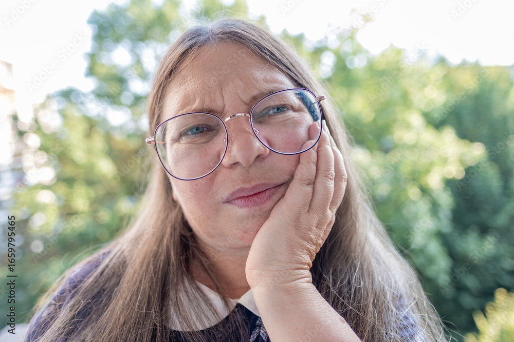 Senior woman suffering from dental pain, toothache expression, mature female with toothache, painful teeth, implant adjustment healing, oral care, dentistry, healthcare, medical treatment concept Senior woman suffering from dental pain, toothache expression, mature female with toothache, painful teeth, implant adjustment healing, oral care, dentistry, healthcare, medical treatment concept