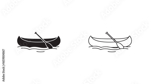 Canoe with paddle on water