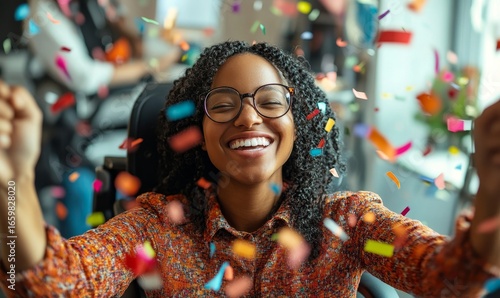 Happy disabled African American woman celebrating her new job and work success. The image shows a woman with a disability cheering with confetti, symbolizing achievement, Generative AI