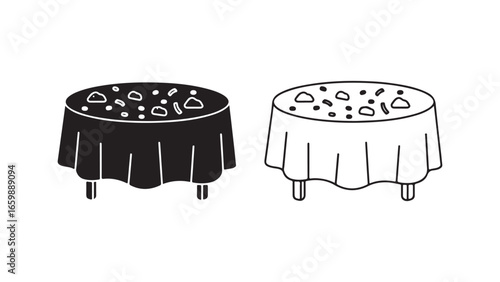 Table with tablecloth and food items