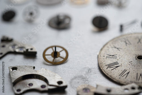 Pocket watch mechanism. Mechanical steel clockwork with cogwheel and screw