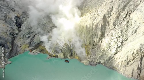 Drone Pan Over Sulfur Workers and Smoke at Kawah Ijen Volcano