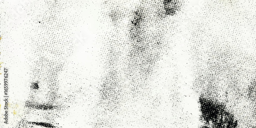 Minimal monochrome texture with scattered black speckles on white