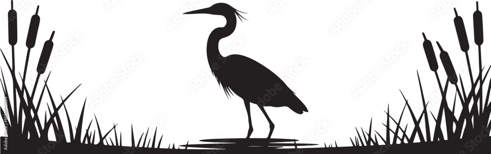 Fototapeta premium Silhouette of a heron standing in water surrounded by cattails and grass in a marsh setting