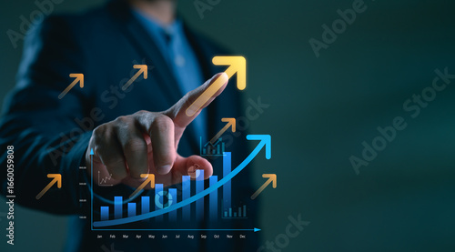 Businessman touching growth arrow and bar chart on virtual screen. Concept of business success, data-driven performance, sales increase, digital transformation and financial progress.
