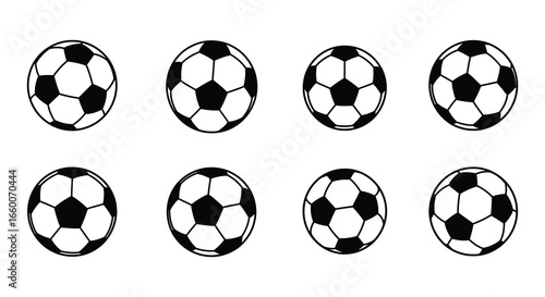 Eight black and white soccer balls in a grid pattern on white background