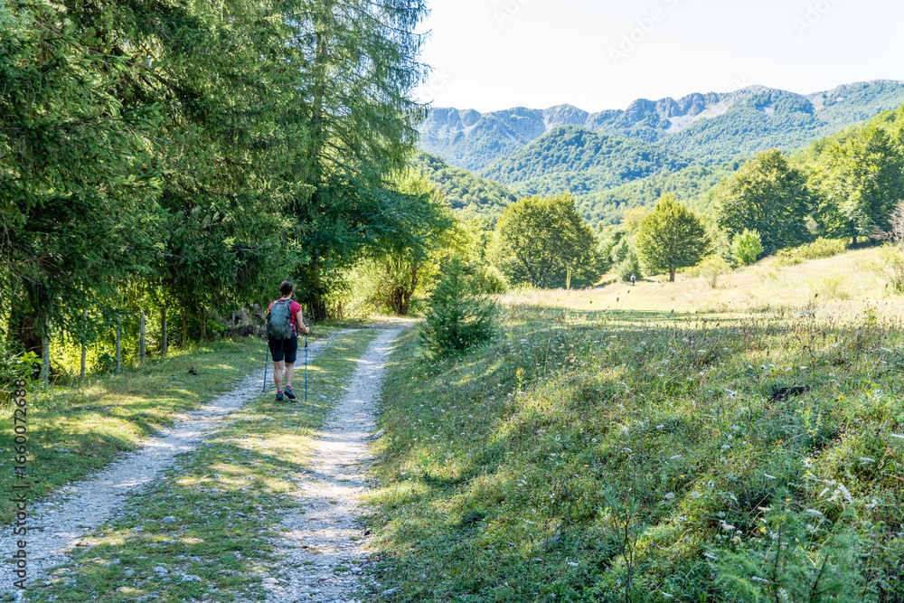 Fototapeta premium Italy Abruzzo Val Fondillo, summer trekking and hiking on nature trails in the fairy cave, grotta delle Fate