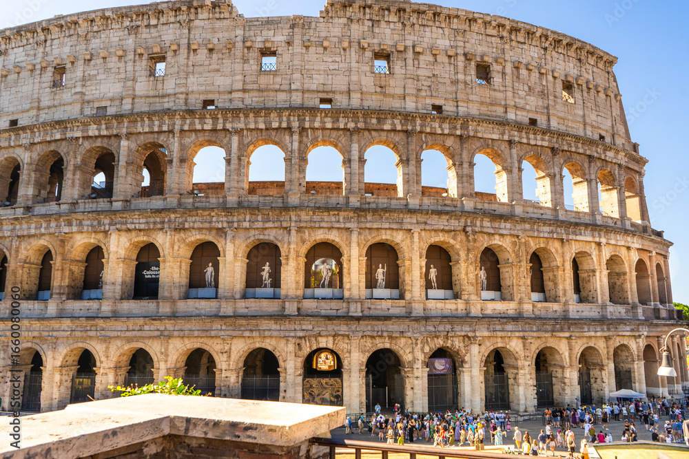 Fototapeta premium Colosseum Rome Italy architecture closeup. Coliseum building, over tourism in summer.