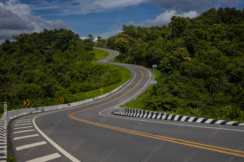 Fototapeta premium Sky Road, Curve No. 3, Nan Province, is on Highway No. 1081, traveling from Santisuk District to Bo Kluea District. It is a famous check-in point in Nan Province