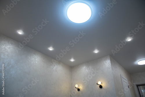 Wallpaper Mural Modern stretch ceiling with LED chandelier and spotlights, modern renovation Torontodigital.ca