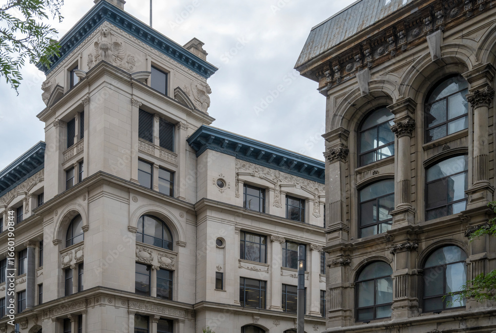 Obraz premium Facade of two stone buildings located in Old Montreal 