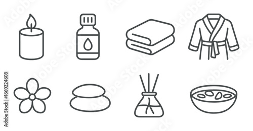 Relaxation essentials: candle, oil, blanket, robe, flower, stones, diffuser, bowl