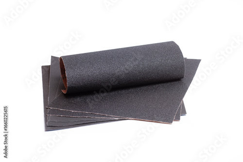 Sheets of black sandpapers isolated on a white background