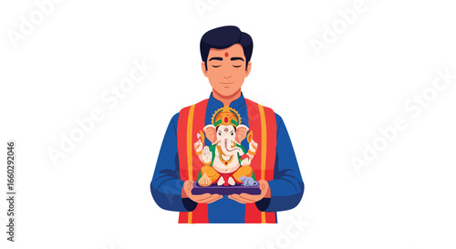 A devout Indian man in traditional clothing holding a colorful Lord Ganesha idol for a Hindu festival.