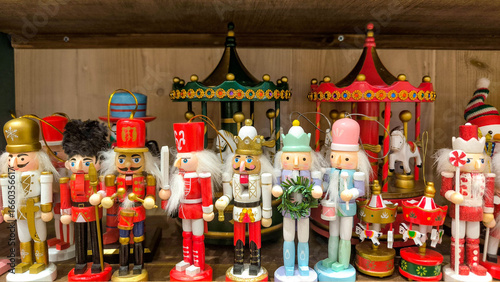 Wooden nutcracker soldier figurines in festive, displayed as Christmas holiday decorations, symbolizing tradition, joy, and seasonal charm.