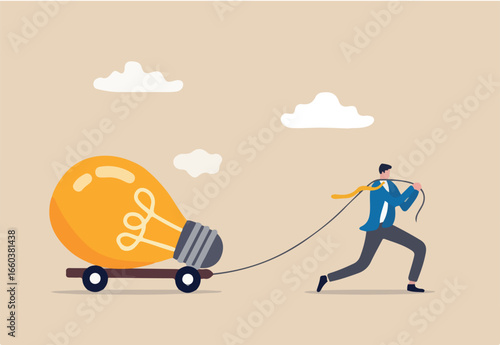 Big business idea, innovation or inspiration to start new business, effort or inspiration for creativity ideas concept, ambitious businessman work hard to pulling big light bulb idea. 