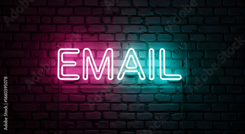 Email neon sign glowing on a brick wall at night, representing digital communication and online messaging