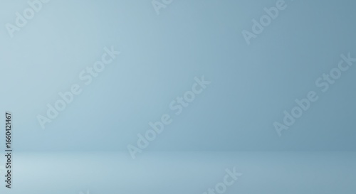 Abstract light blue gradient background in a minimalist empty room for product placement