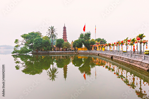 West Lake with the reflections of Tran Quoc Pagoda in Hanoi, Vietnam