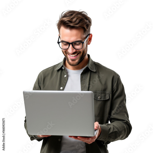 Smiling young man wearing glasses and casual clothing holding a laptop computer isolated on transparent background