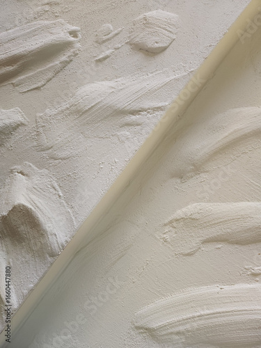 Plaster coating on the wall. Rough decorative plaster