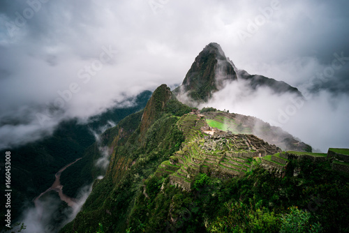 Aerial view of Machu Picchu in the morning fog, Cuzco, Peru