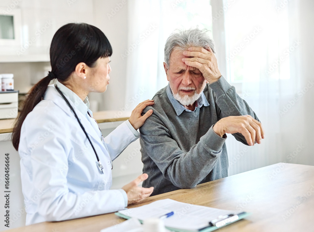 Obraz premium Portrait of a female doctor and senior man patient with a headache at her doctor's office in clinic