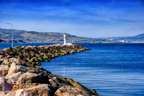 Bandirma, Turkey - February 7, 2024: Marina, embankment and lighthouse