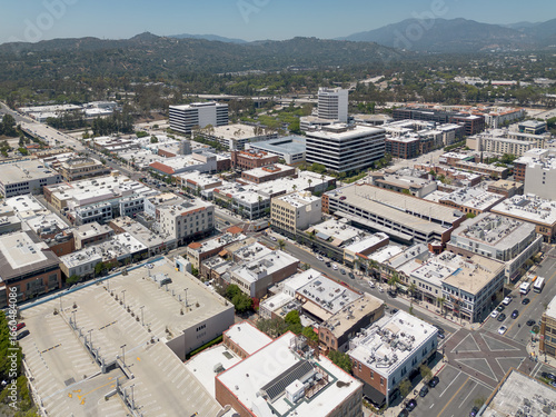 Pasadena, CA, California, LA County, May 19, 2025: Aerial Top View of Pasadena Downtown Colorado Blvd including Streets, Buildings, Shops, Mountain