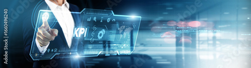 Φωτογραφία Businessman touching kpi on digital screen